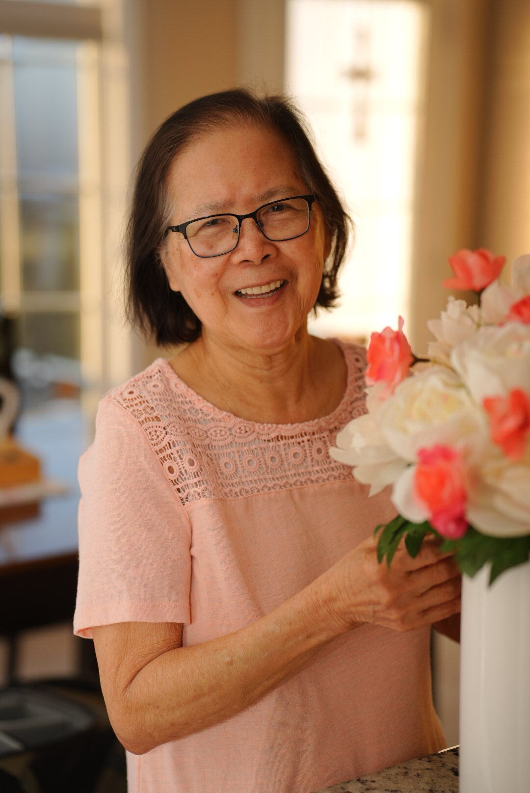 Happy Client with flowers